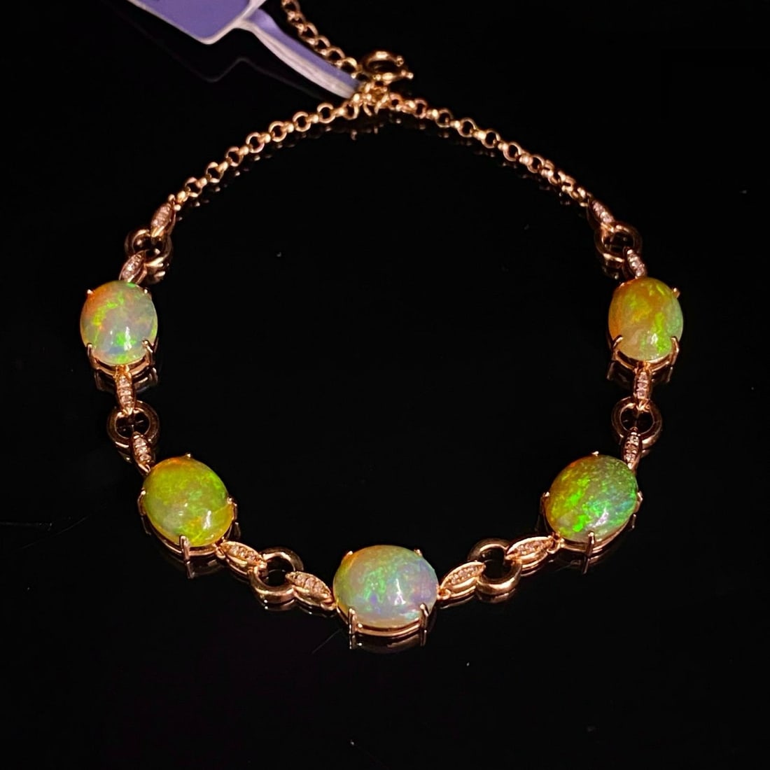 14k Gold 6.05 Ct Natural Opal & Diamond Bracelet: Ref:231186311 // gold content:14k gold // main gemstone:opal // shape:oval // carat weight:6. 05ct // color:color // treatment:natural // // adjacent gemstone 2 : diamond // number of stones:36 // sha