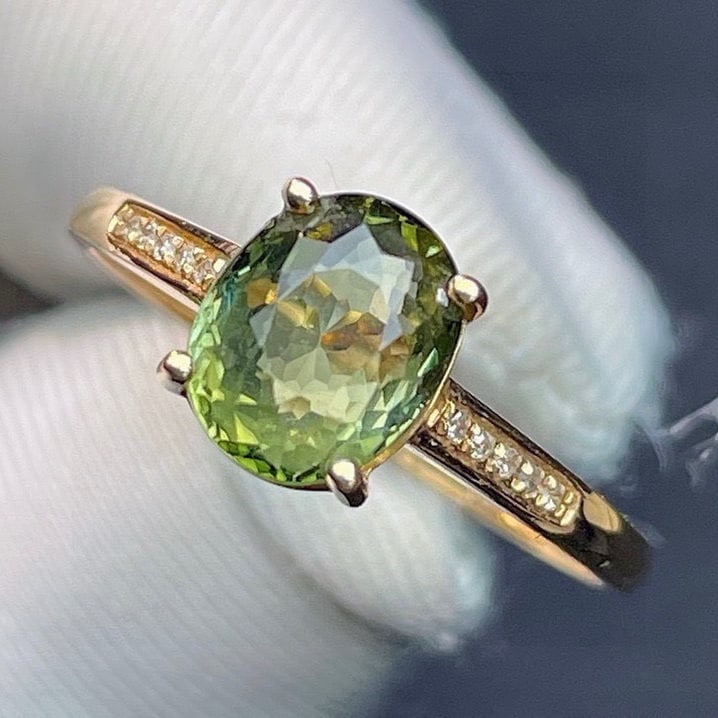 14k Gold 2.7 Ct Natural Tourmaline & Diamond Ring: Ref:231186339 // gold content:14k gold // ring size:7. 25us // // main gemstone:tourmaline // shape:oval // carat weight:2. 7ct // color:green // treatment:natural // // adjacent gemstone 2 : diamond