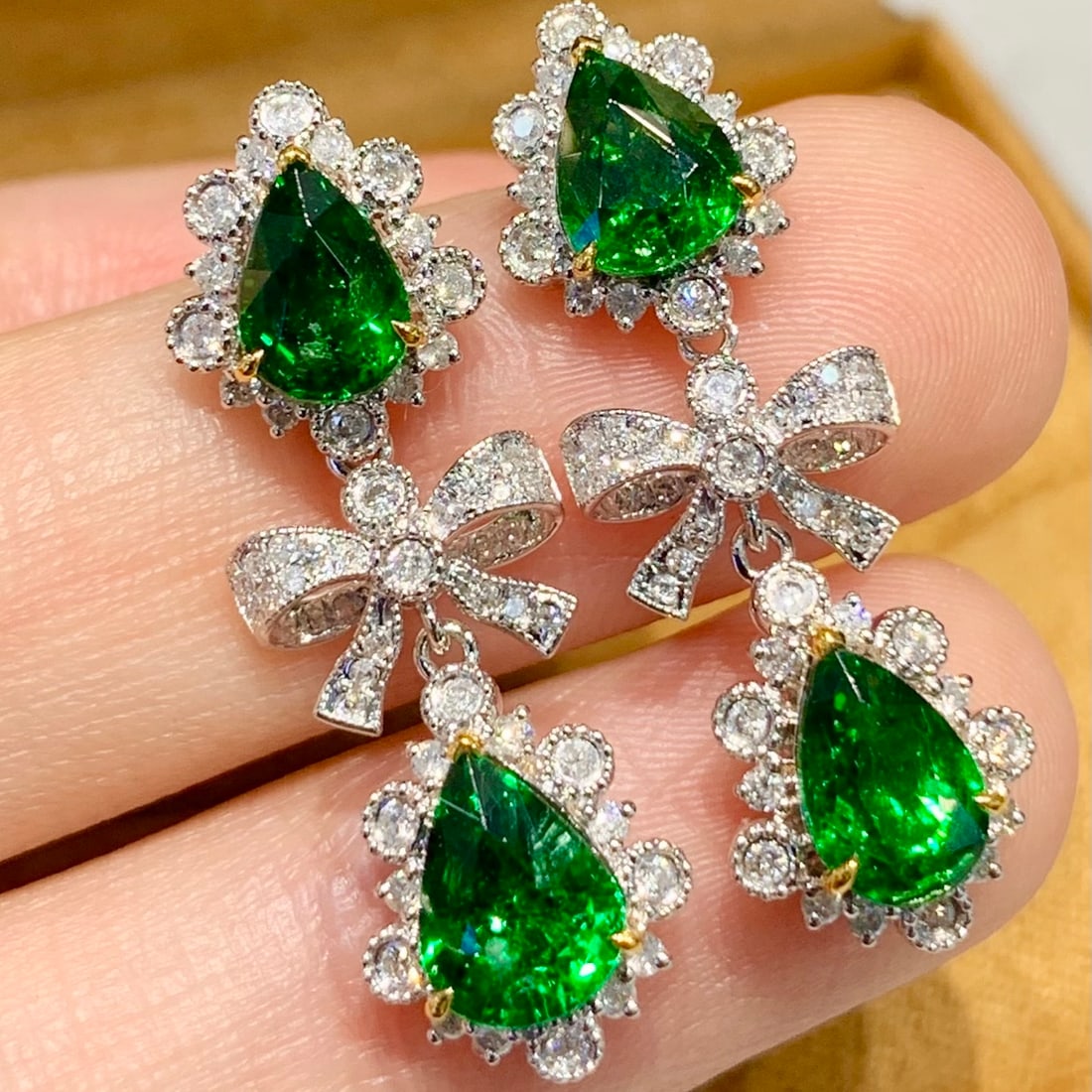 14k Gold 4.2 Ct Vivid Green Natural Tsavorite & Diamond Earrings: Ref:231186381 // gold content:14k gold // main gemstone:tsavorite // shape:pear // carat weight:4. 2ct // color:vivid green // treatment:natural // // adjacent gemstone 2 : diamond // shape:round //