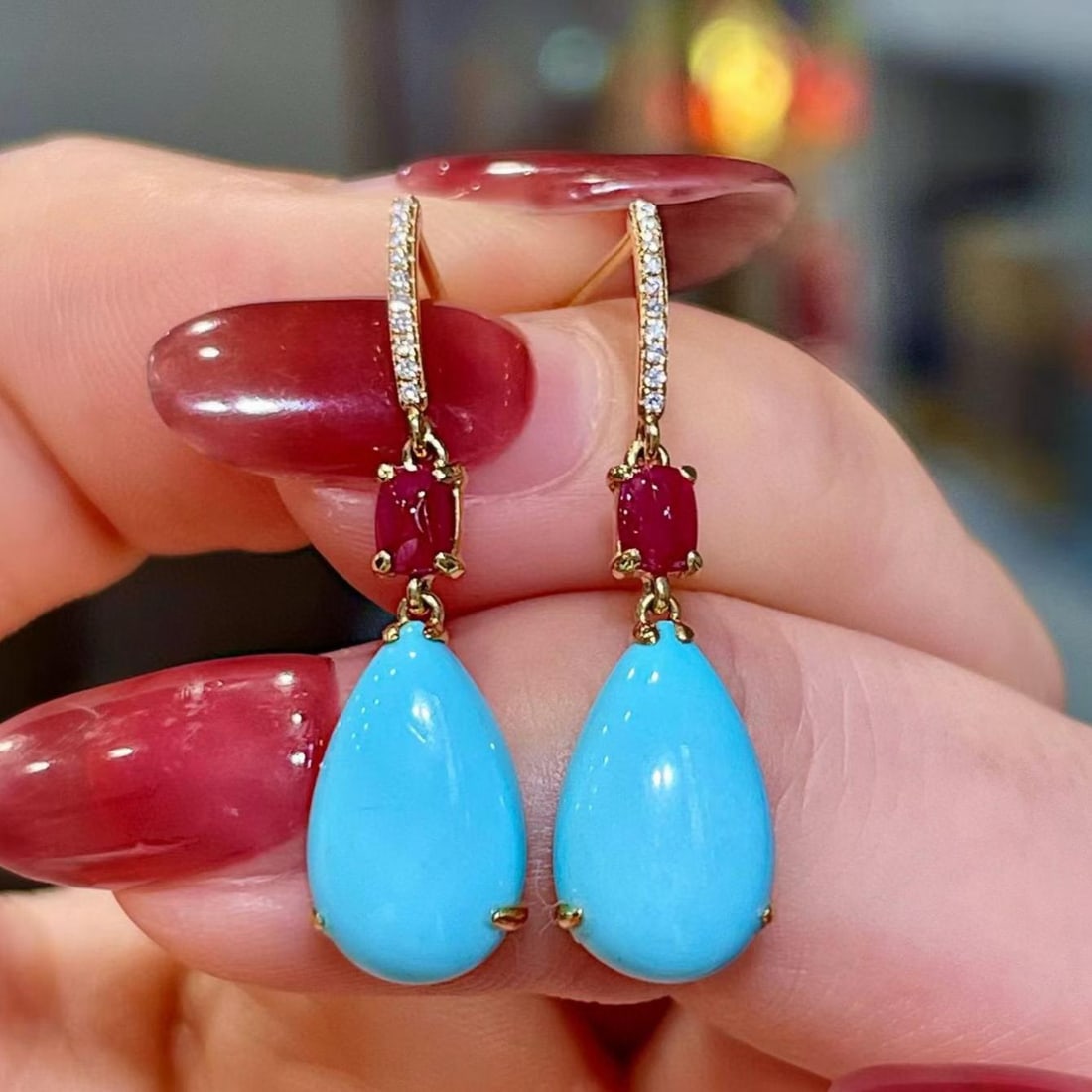 14k Gold 5.41 Ctw Natural Blue Turquoise & Ruby Earrings: Ref:231186382 // gold content:14k gold // main gemstone:blue turquoise // shape:pear // carat weight:4. 98ct // color:blue // treatment:natural // // adjacent gemstone 2 : ruby // shape:sugar-loaf // 