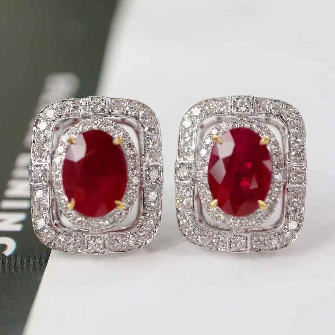 14k Gold 2.61 Ctw Natural Ruby & Diamond Earrings: Ref:231186398 // gold content:14k gold // main gemstone:ruby // shape:oval // carat weight:2. 16ct // color:pigeonblood red // treatment:natural // // adjacent gemstone 2 : diamond // shape:round //