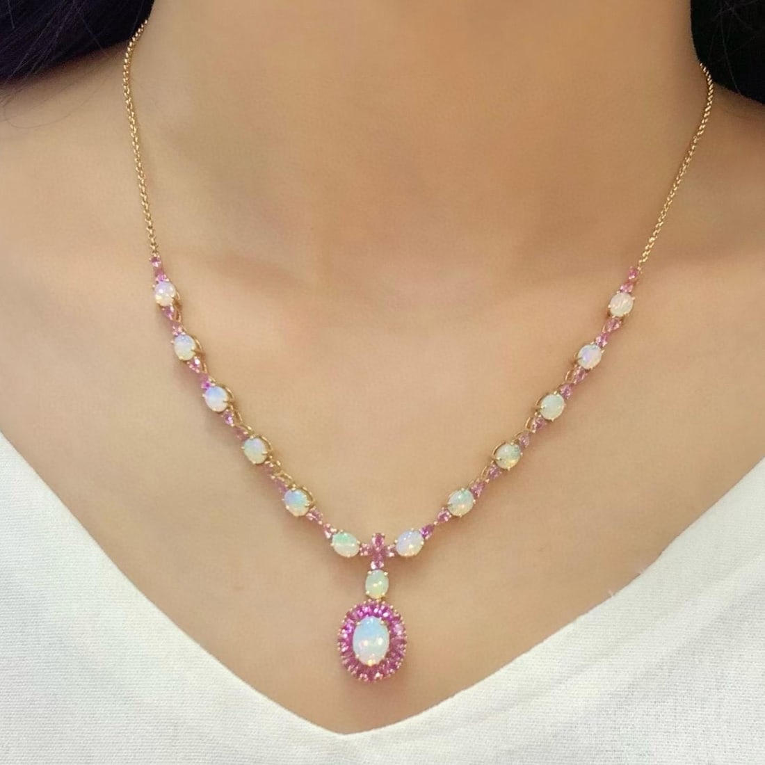 14k Gold 6.45 Ctw Natural Opal & Sapphire Necklace: Ref:231186404 // gold content:14k gold // main gemstone:opal // shape:oval // carat weight:3. 3ct // color:white // treatment:natural // // adjacent gemstone 2 : sapphire // number of stones:44 // sha