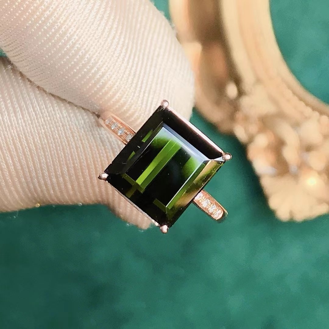14k Gold 4.79 Ctw Natural Tourmaline & Diamond Ring: Ref:231186424 // gold content:14k gold // ring size:7. 25us // // main gemstone:tourmaline // shape:octagonal // carat weight:4. 75ct // color:green // treatment:natural // // adjacent gemstone 2 :