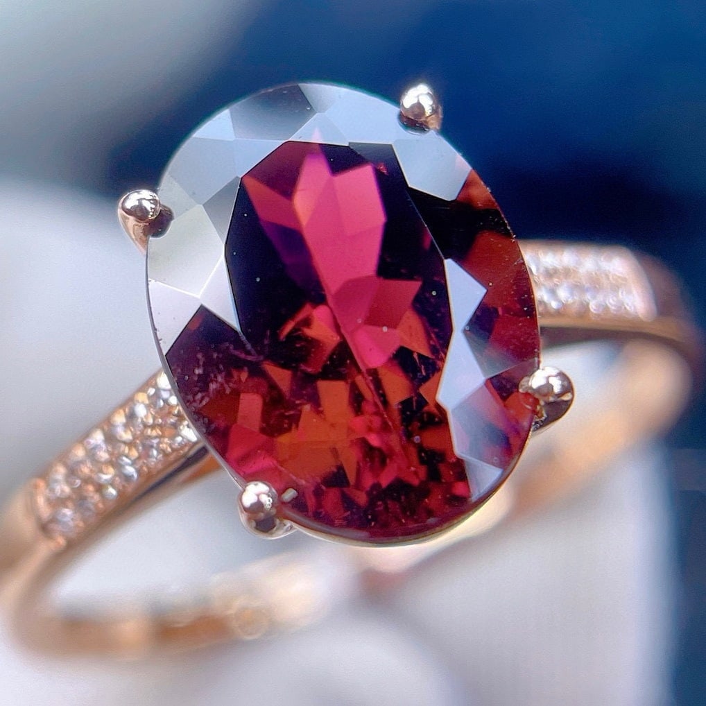 14k Gold 2.8 Ct Natural Tourmaline & Diamond Ring: Ref:231186427 // gold content:14k gold // ring size:7. 25us // // main gemstone:tourmaline // shape:oval // carat weight:2. 8ct // color:red // treatment:natural // // adjacent gemstone 2 : diamond