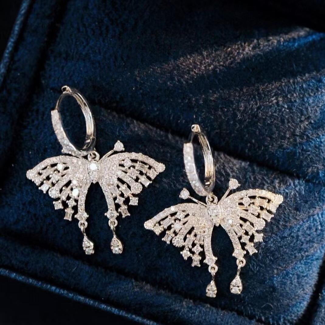 14k Gold 1.36 Ct Natural H Diamond & Butterfly Earrings: Ref:231187010 // gold content:14k gold // main gemstone:diamond // shape:multiple // carat weight:1. 36ct // clarity grade:vs-si // color:h // treatment:natural // Condition: New Low Estimate: