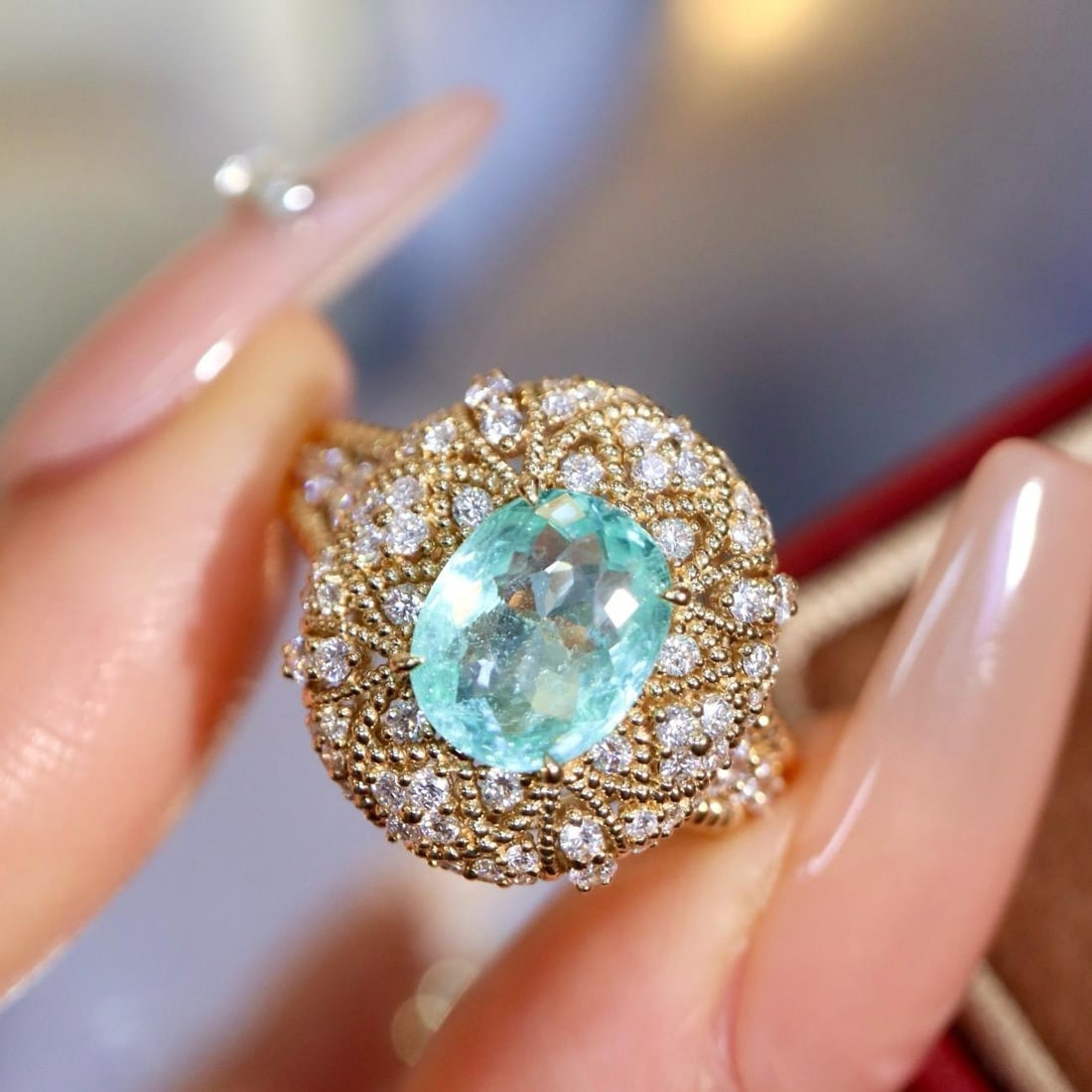 14k Gold 2.39 Ctw Natural Paraiba Tourmaline & Diamond Ring: Ref:231187021 // gold content:14k gold // ring size:7. 25us // // main gemstone:paraiba tourmaline // shape:oval // carat weight:1. 64ct // color:bluish green // treatment:natural // // adjacent