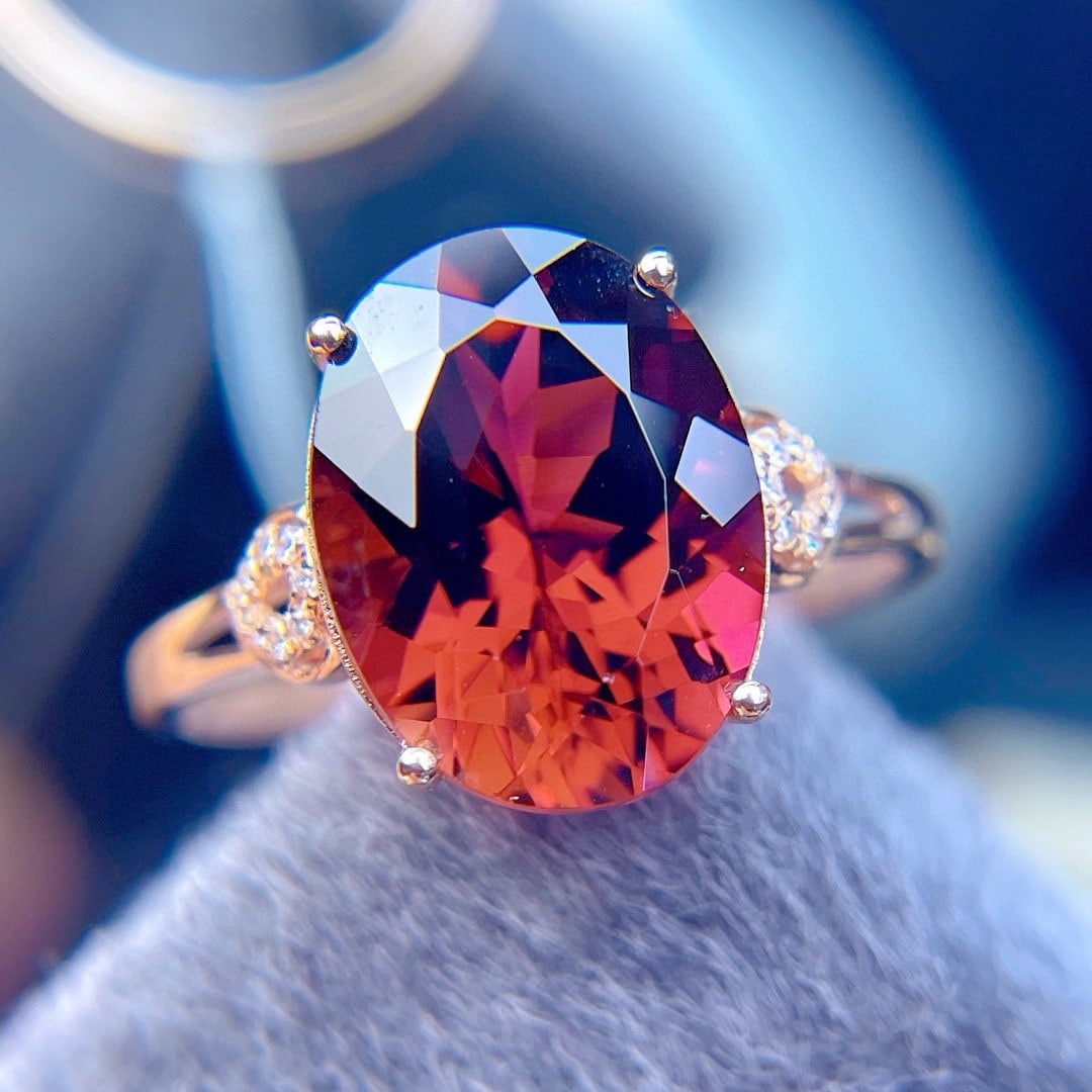 14k Gold 4.7 Ct Natural Tourmaline & Diamond Ring: Ref:231187022 // gold content:14k gold // ring size:7. 25us // // main gemstone:tourmaline // shape:oval // carat weight:4. 7ct // color:red // treatment:natural // // adjacent gemstone 2 : diamond