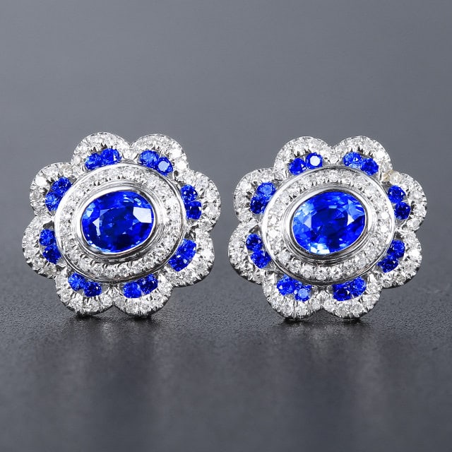 14k Gold 1.39 Ctw Natural Sapphire & Sapphire Earrings: Ref:231187032 // gold content:14k gold // main gemstone:sapphire // shape:oval // carat weight:1. 06ct // color:blue // treatment:natural // // adjacent gemstone 2 : sapphire // shape:round // carat