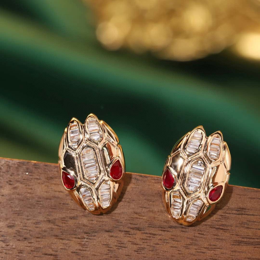 14k Gold 0.72 Ctw Natural Ruby & Diamond & Snake Earrings: Ref:231187046 // gold content:14k gold // main gemstone:ruby // shape:pear // carat weight:0. 32ct // color:red // treatment:natural // // adjacent gemstone 2 : diamond // shape:baguette // carat