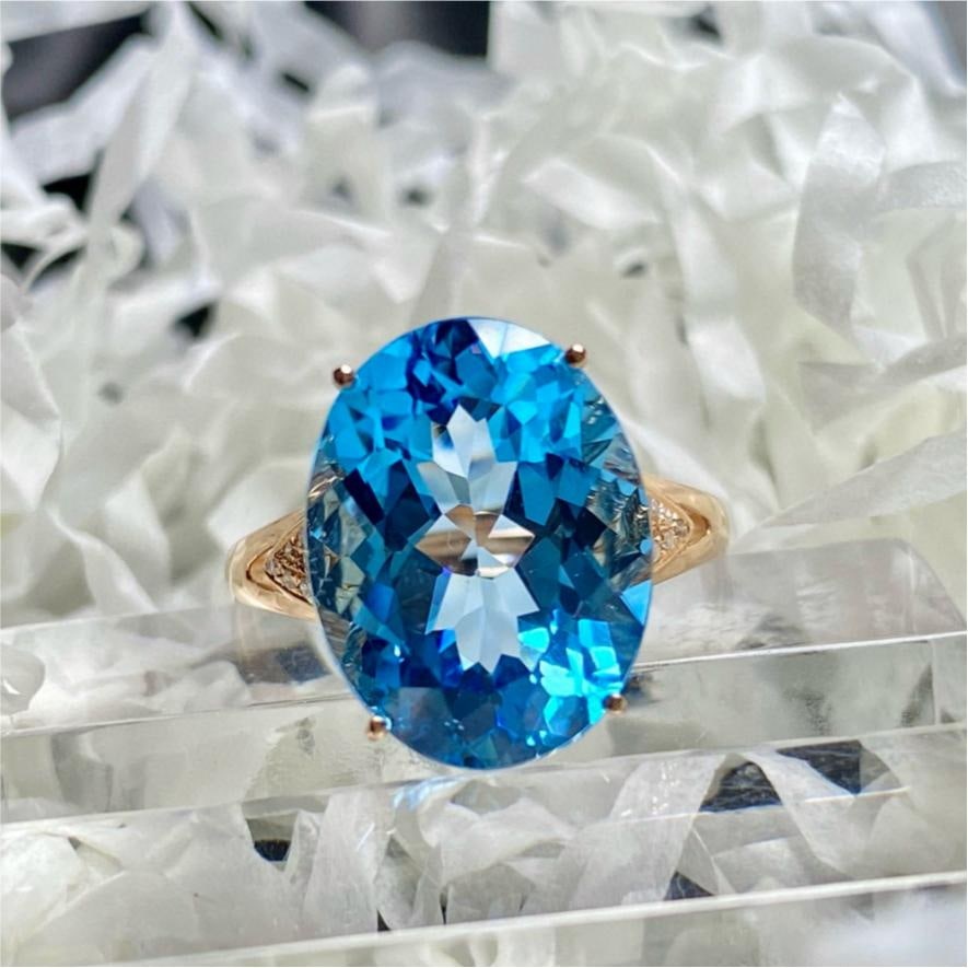 14k Gold 9.25 Ct Natural Topaz & Diamond Ring: Ref:231187058 // gold content:14k gold // ring size:7. 25us // // main gemstone:topaz // shape:oval // carat weight:9. 25ct // color:blue // treatment:natural // // adjacent gemstone 2 : diamond //