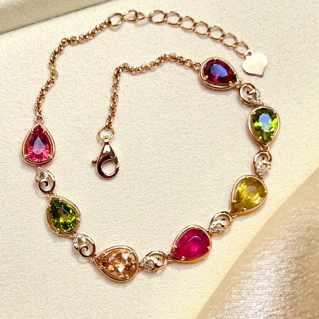 14k Gold 5.8 Ct Natural Tourmaline & Diamond Bracelet: Ref:231187069 // gold content:14k gold // main gemstone:tourmaline // shape:pear // carat weight:5. 8ct // color:color // treatment:natural // // adjacent gemstone 2 : diamond // number of stones:30
