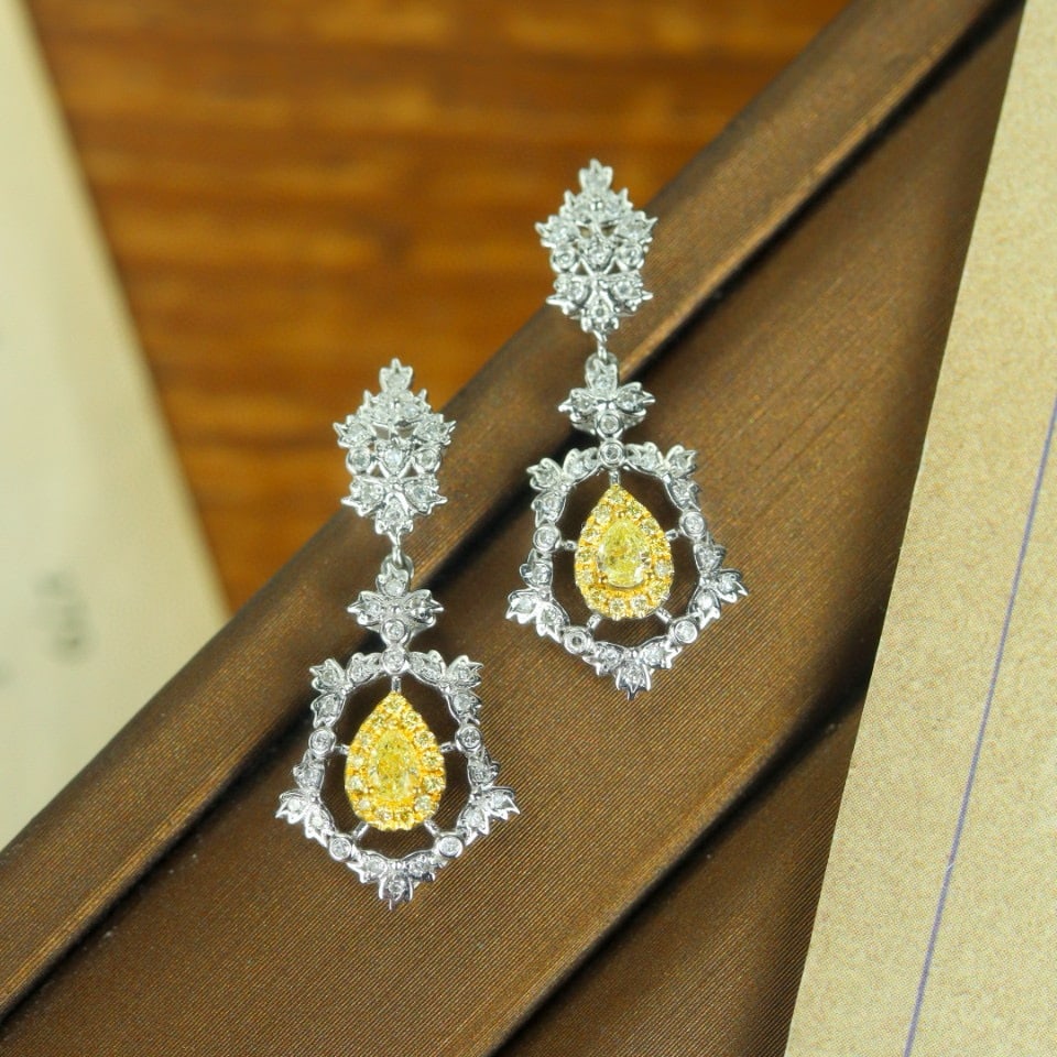 14k Gold 0.66 Ctw Natural Yellow Diamond & Diamond Earrings: Ref:231187099 // gold content:14k gold // main gemstone:yellow diamond // shape:pear // carat weight:0. 30ct // color:yellow // treatment:natural // // adjacent gemstone 2 : diamond // shape:round //