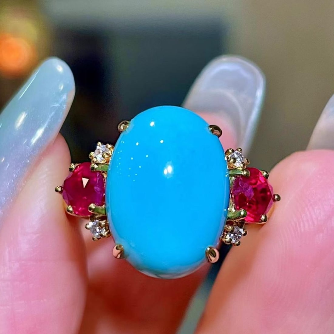 14k Gold 7.85 Ctw Natural Blue Turquoise & Ruby Ring: Ref:231187124 // gold content:14k gold // ring size:7. 25us // // main gemstone:blue turquoise // shape:oval // carat weight:6. 83ct // color:blue // treatment:natural // // adjacent gemstone 2 :