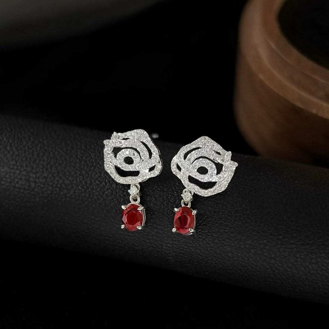 14k Gold 0.5 Ct Natural Ruby & Diamond Earrings: Ref:231187153 // gold content:14k gold // main gemstone:ruby & diamond // shape:oval & round // carat weight:0. 5ct // color:red & white // treatment:natural // Condition: New Low Estimate: 1900.00 Hi