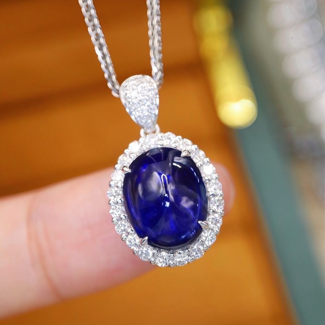 14k Gold 5.13 Ctw Natural Sapphire & Diamond Pendant( Without Chain ): Ref:231187179 // gold content:14k gold // main gemstone:sapphire // shape:oval // carat weight:4. 67ct // color:blue // treatment:natural // // adjacent gemstone 2 : diamond // number of stones:41 // 