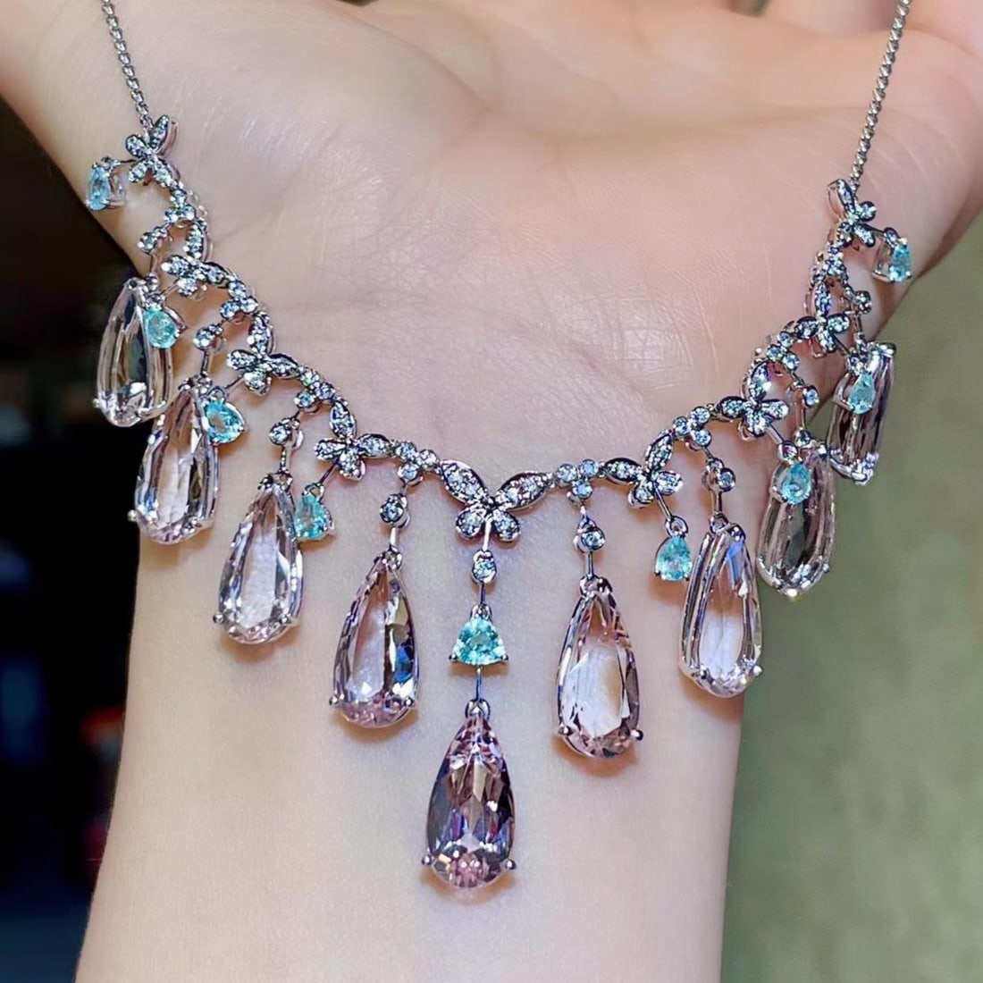 14k Gold 21.48 Ctw Natural Morganite & Paraiba Tourmaline Necklace: Ref:231187215 // gold content:14k gold // main gemstone:morganite // shape:pear // carat weight:20. 41ct // color:pink // treatment:natural // // adjacent gemstone 2 : paraiba tourmaline //