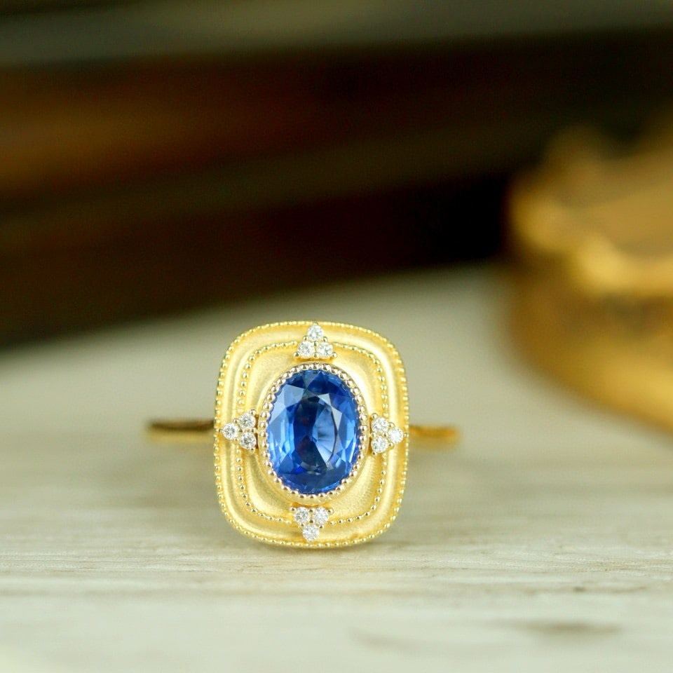 14k Gold 1.26 Ctw Natural Sapphire & Diamond Ring: Ref:231187251 // gold content:14k gold // ring size:7. 25us // // main gemstone:sapphire // shape:oval // carat weight:1. 21ct // color:blue // treatment:natural // // adjacent gemstone 2 : diamond