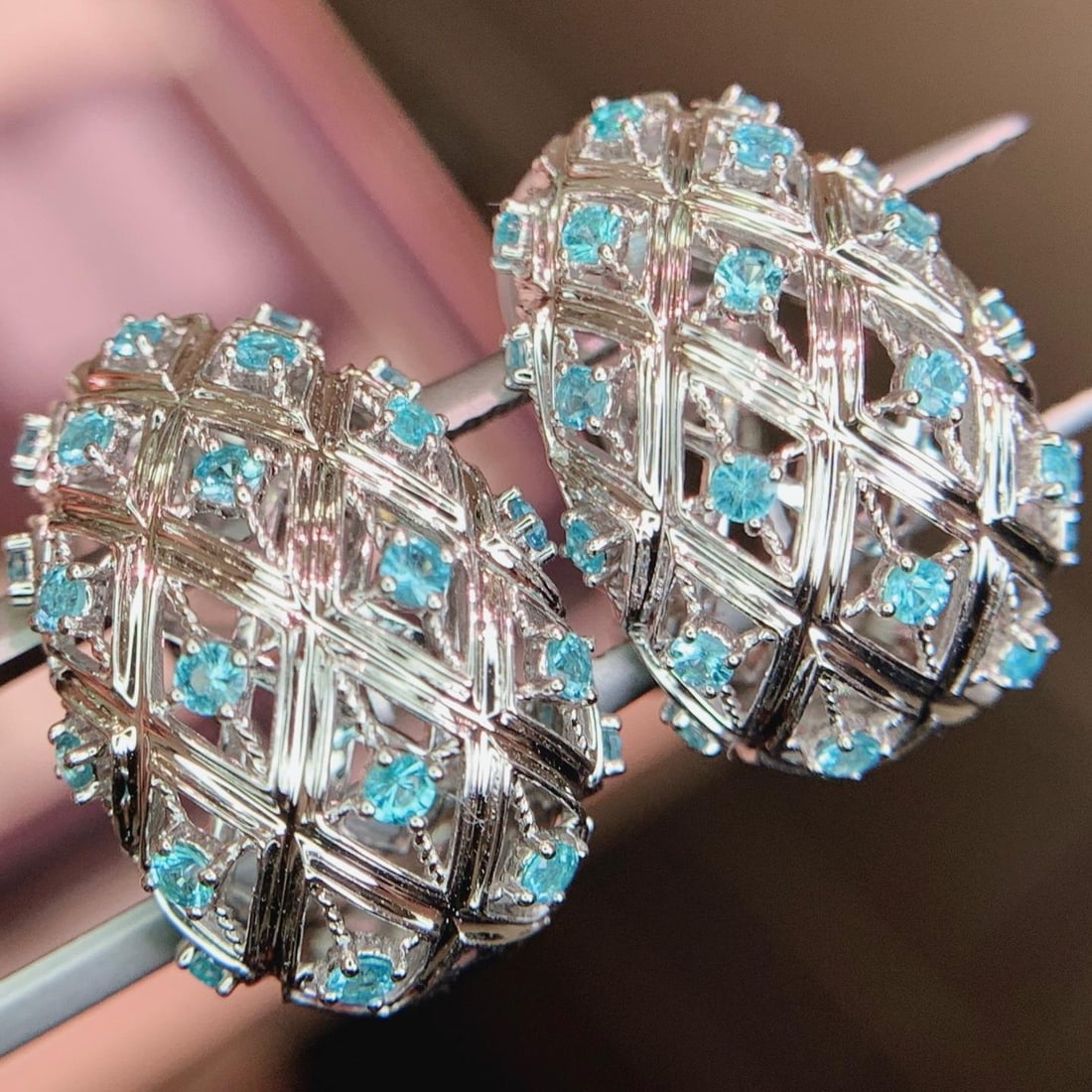 14k Gold 0.69 Ct Natural Paraiba Tourmaline Earrings: Ref:231188021 // gold content:14k gold // main gemstone:paraiba tourmaline // shape:round // carat weight:0. 69ct // color:blue // treatment:natural // cut grade:g // Condition: New Low Estimate: