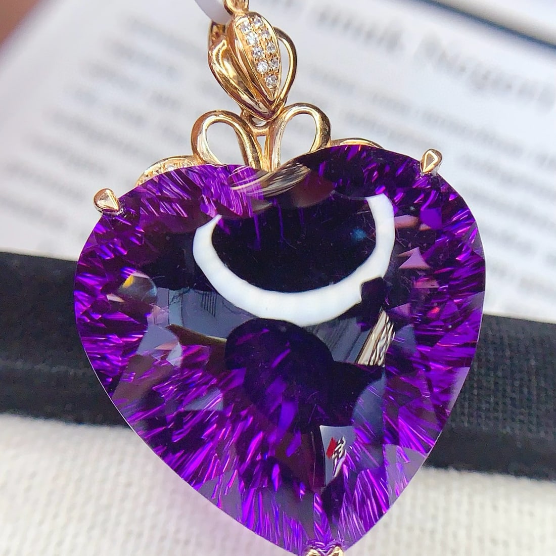 14k Gold 44.7 Ct Natural Amethyst & Diamond Pendant( Without Chain ): Ref:231188026 // gold content:14k gold // main gemstone:amethyst // shape:heart // carat weight:44. 7ct // color:purple // treatment:natural // // adjacent gemstone 2 : diamond // number of stones:19