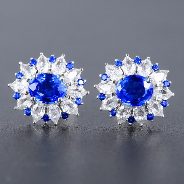 14k Gold 1.35 Ctw Natural Sapphire & Sapphire Earrings: Ref:231188032 // gold content:14k gold // main gemstone:sapphire // shape:oval // carat weight:1. 14ct // color:blue // treatment:natural // // adjacent gemstone 2 : sapphire // shape:round // carat w