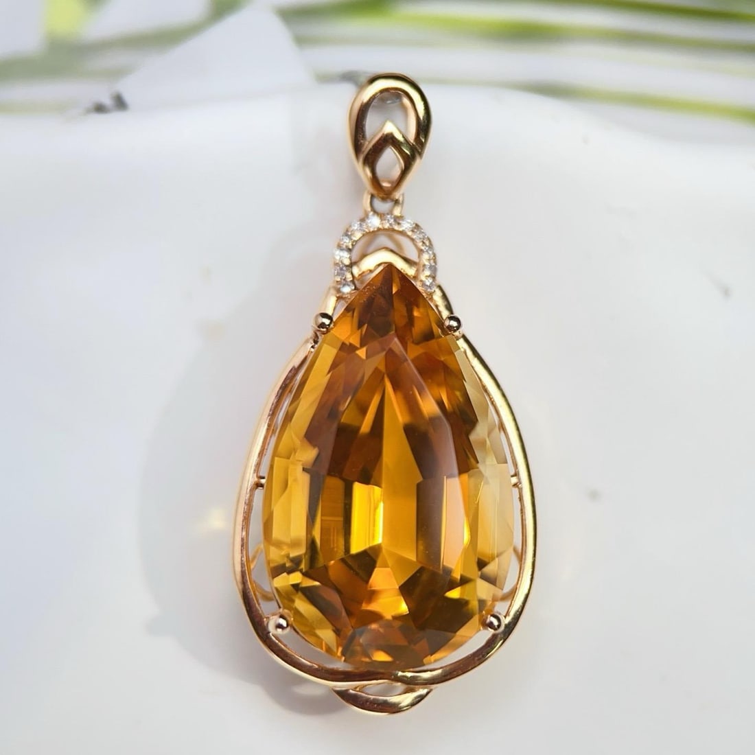 14k Gold 14.43 Ctw Natural Citrine & Diamond Pendant( Without Chain ): Ref:231188069 // gold content:14k gold // main gemstone:citrine // shape:pear // carat weight:14. 4ct // color:yellow // treatment:natural // // adjacent gemstone 2 : diamond // number of stones:12 //
