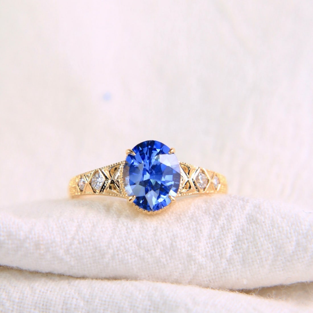 14k Gold 2.20 Ctw Natural Sapphire & Diamond Ring: Ref:231188081 // gold content:14k gold // ring size:7. 25us // // main gemstone:sapphire // shape:oval // carat weight:2. 1ct // color:cornflower blue // treatment:natural // // adjacent gemstone 2 :
