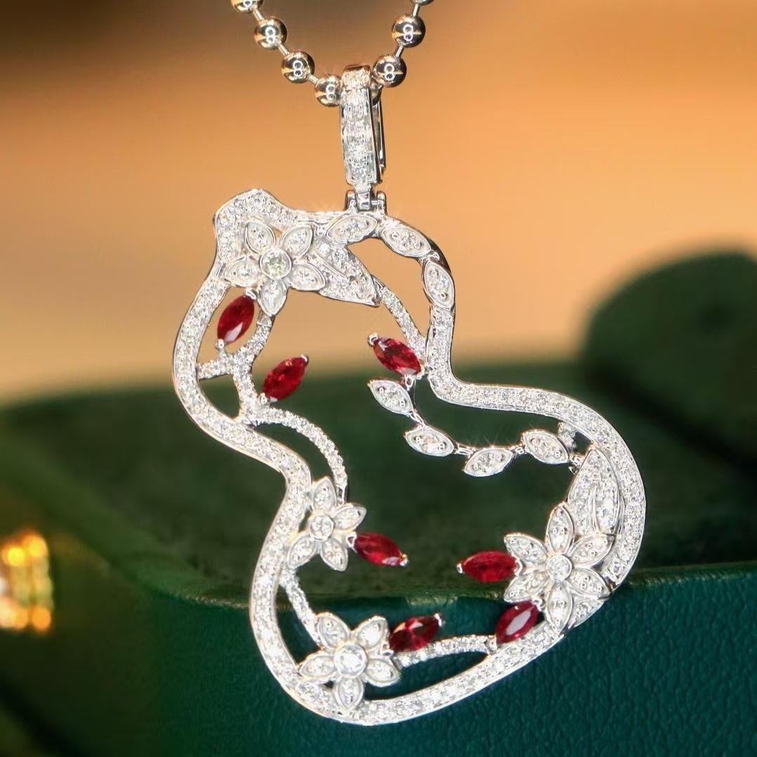14k Gold 1.23 Ctw Natural Ruby & Diamond Pendant( Without Chain ): Ref:231188095 // gold content:14k gold // main gemstone:ruby // shape:marquise // carat weight:0. 65ct // color:red // treatment:natural // // adjacent gemstone 2 : diamond // shape:round // carat wei