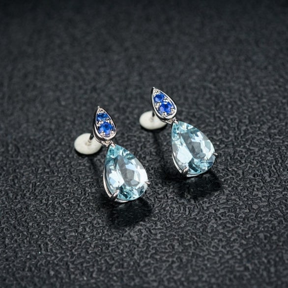 14k Gold 3.66 Ct Natural Aquamarine & Sapphire Earrings: Ref:231188112 // gold content:14k gold // main gemstone:aquamarine // shape:pear // carat weight:3. 66ct // color:blue // treatment:natural // // adjacent gemstone 2 : sapphire // shape:round //