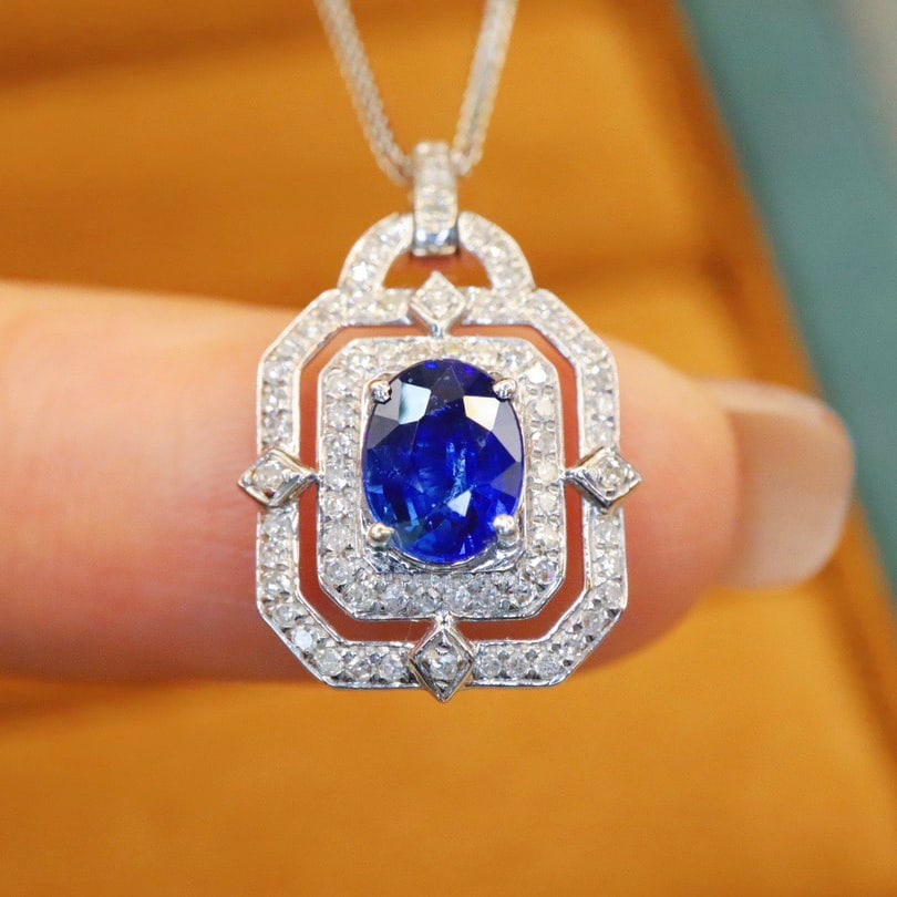 14k Gold 1.22 Ctw Natural Sapphire & Diamond Pendant( Without Chain ): Ref:231188127 // gold content:14k gold // main gemstone:sapphire // shape:oval // carat weight:1. 00ct // color:blue // treatment:natural // // adjacent gemstone 2 : diamond // number of stones:74 // 
