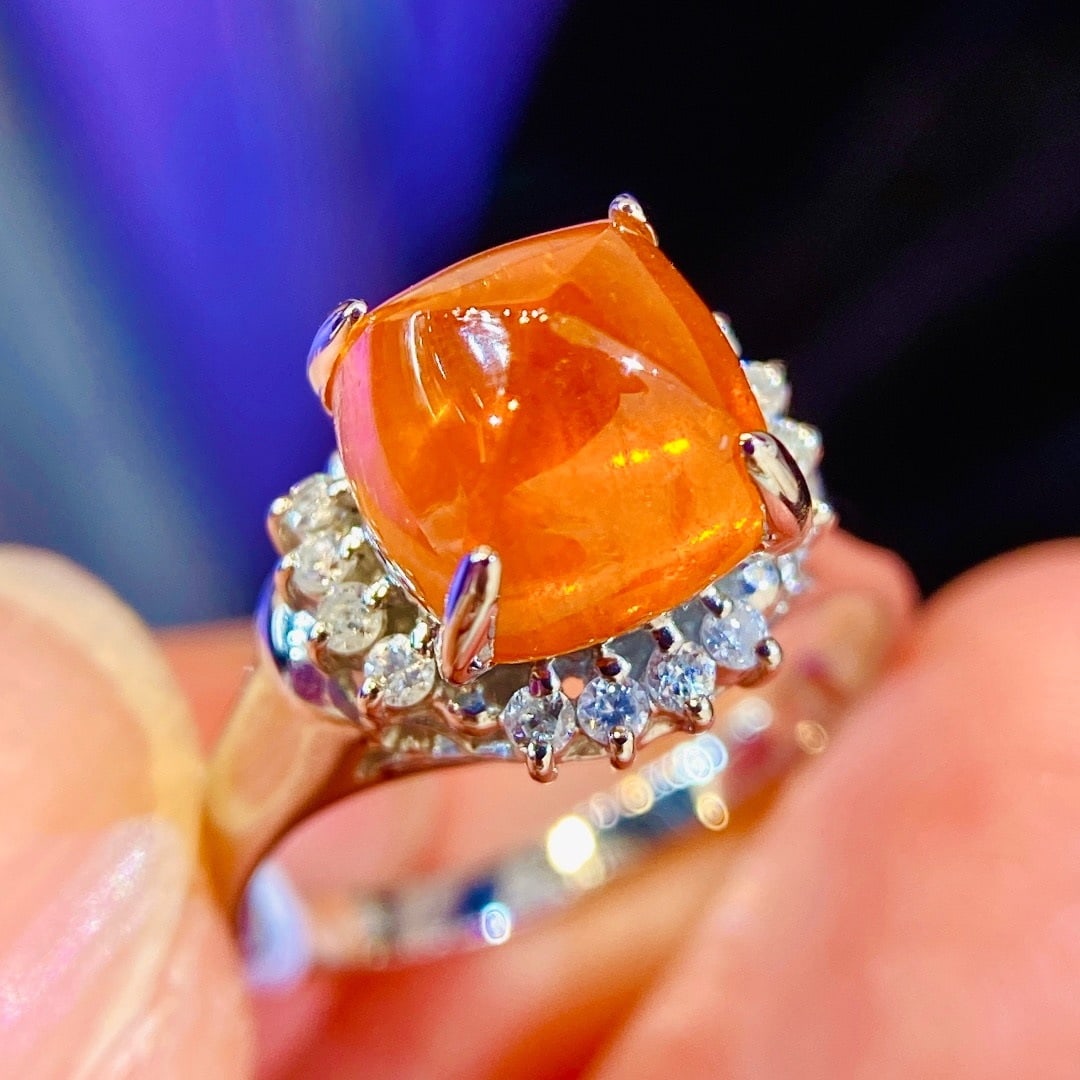 14k Gold 4.23 Ctw Natural Spessartine & Diamond Ring: Ref:231188158 // gold content:14k gold // ring size:7. 25us // // main gemstone:spessartine // shape:sugar-loaf // carat weight:4. 0ct // color:orange // treatment:natural // // adjacent gemstone 2 :