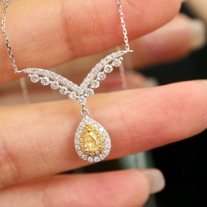 14k Gold 0.58 Ctw Natural Yellow Diamond & Diamond Necklace: Ref:231188186 // gold content:14k gold // main gemstone:yellow diamond // shape:pear // carat weight:0. 20ct // color:yellow // treatment:natural // // adjacent gemstone 2 : diamond // shape:round //