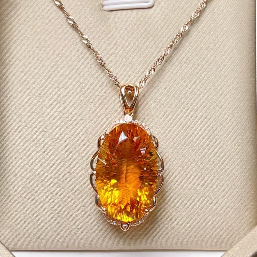 14k Gold 19.02 Ctw Natural Citrine & Diamond Pendant( Without Chain ): Ref:231188206 // gold content:14k gold // main gemstone:citrine // shape:oval // carat weight:18. 95ct // color:yellow // treatment:natural // // adjacent gemstone 2 : diamond // number of stones:22 /