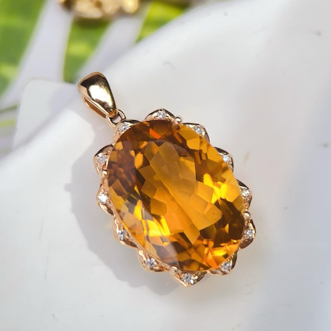 14k Gold 12.76 Ctw Natural Citrine & Diamond Pendant( Without Chain ): Ref:231188251 // gold content:14k gold // main gemstone:citrine // shape:oval // carat weight:12. 7ct // color:yellow // treatment:natural // // adjacent gemstone 2 : diamond // number of stones:12 //