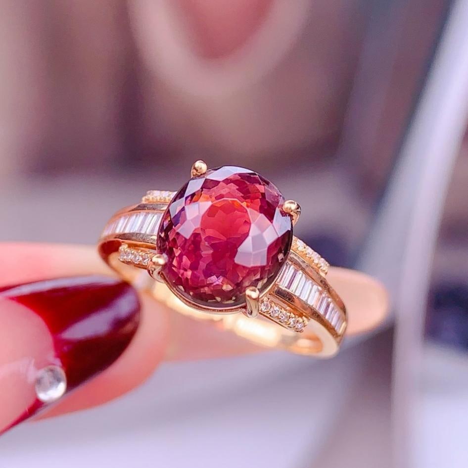 14k Gold 4.5 Ct Natural Tourmaline & Diamond Ring: Ref:231188328 // gold content:14k gold // ring size:7. 25us // // main gemstone:tourmaline // shape:oval // carat weight:4. 5ct // color:red // treatment:natural // // adjacent gemstone 2 : diamond