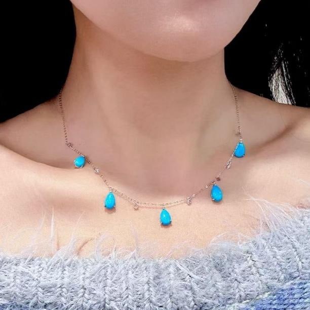 14k Gold 3.40 Ctw Natural Blue Turquoise & Diamond Necklace: Ref:231188329 // gold content:14k gold // main gemstone:blue turquoise // shape:pear // carat weight:3. 25ct // color:blue // treatment:natural // // adjacent gemstone 2 : diamond // shape:round //