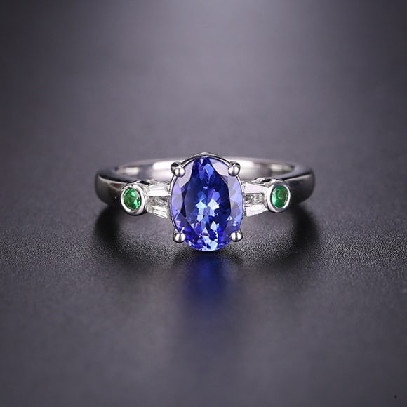 14k Gold 1.51 Ctw Natural Tanzanite & Diamond Ring: Ref:231188334 // gold content:14k gold // ring size:7. 25us // // main gemstone:tanzanite // shape:oval // carat weight:1. 45ct // color:blue // treatment:natural // // adjacent gemstone 2 : diamond
