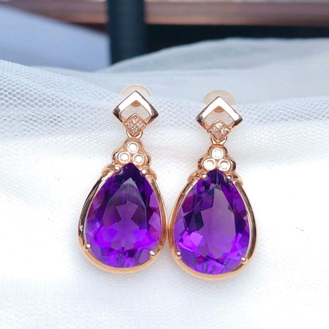 14k Gold 10.05 Ct Natural Amethyst & Diamond Earrings: Ref:231188337 // gold content:14k gold // main gemstone:amethyst // shape:pear // carat weight:10. 05ct // color:purple // treatment:natural // // adjacent gemstone 2 : diamond // number of stones:14
