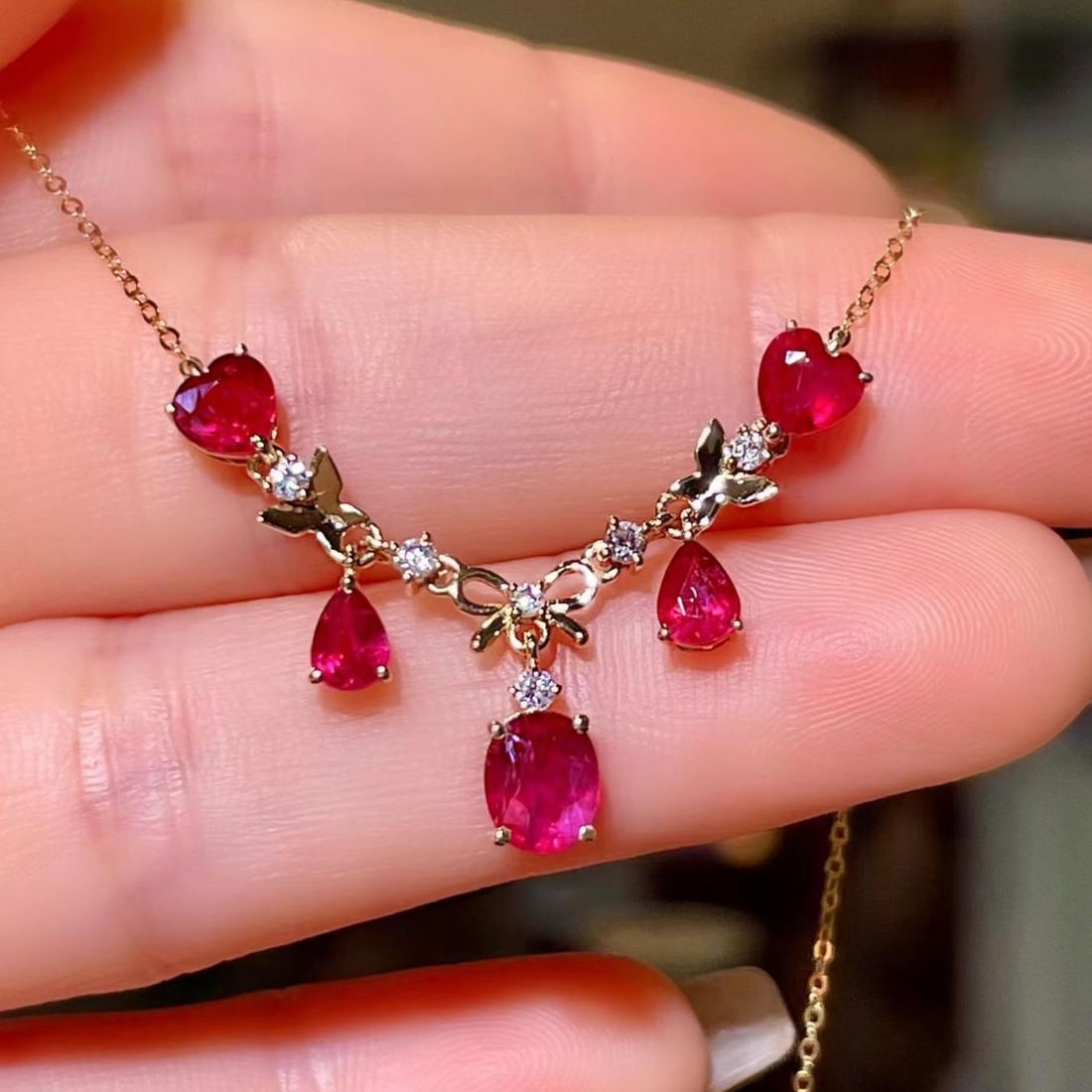 14k Gold 2.28 Ctw Natural Ruby & Diamond Necklace: Ref:231188343 // gold content:14k gold // main gemstone:ruby // shape:multiple // carat weight:2. 16ct // color:red // treatment:natural // // adjacent gemstone 2 : diamond // shape:round // carat wei