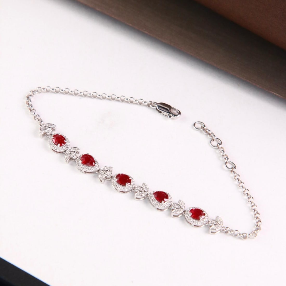 14k Gold 2.18 Ctw Natural Ruby & Diamond Bracelet: Ref:231188344 // gold content:14k gold // main gemstone:ruby // shape:multiple // carat weight:1. 8ct // color:pigeonblood red // treatment:natural // // adjacent gemstone 2 : diamond // shape:round /