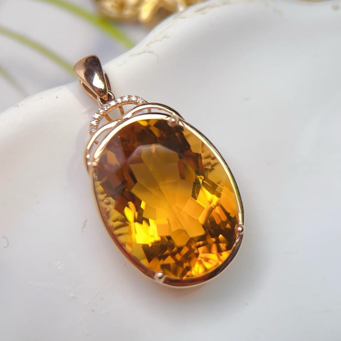 14k Gold 17.08 Ctw Natural Citrine & Diamond Pendant( Without Chain ): Ref:231188387 // gold content:14k gold // main gemstone:citrine // shape:oval // carat weight:17. 05ct // color:yellow // treatment:natural // // adjacent gemstone 2 : diamond // number of stones:10 /