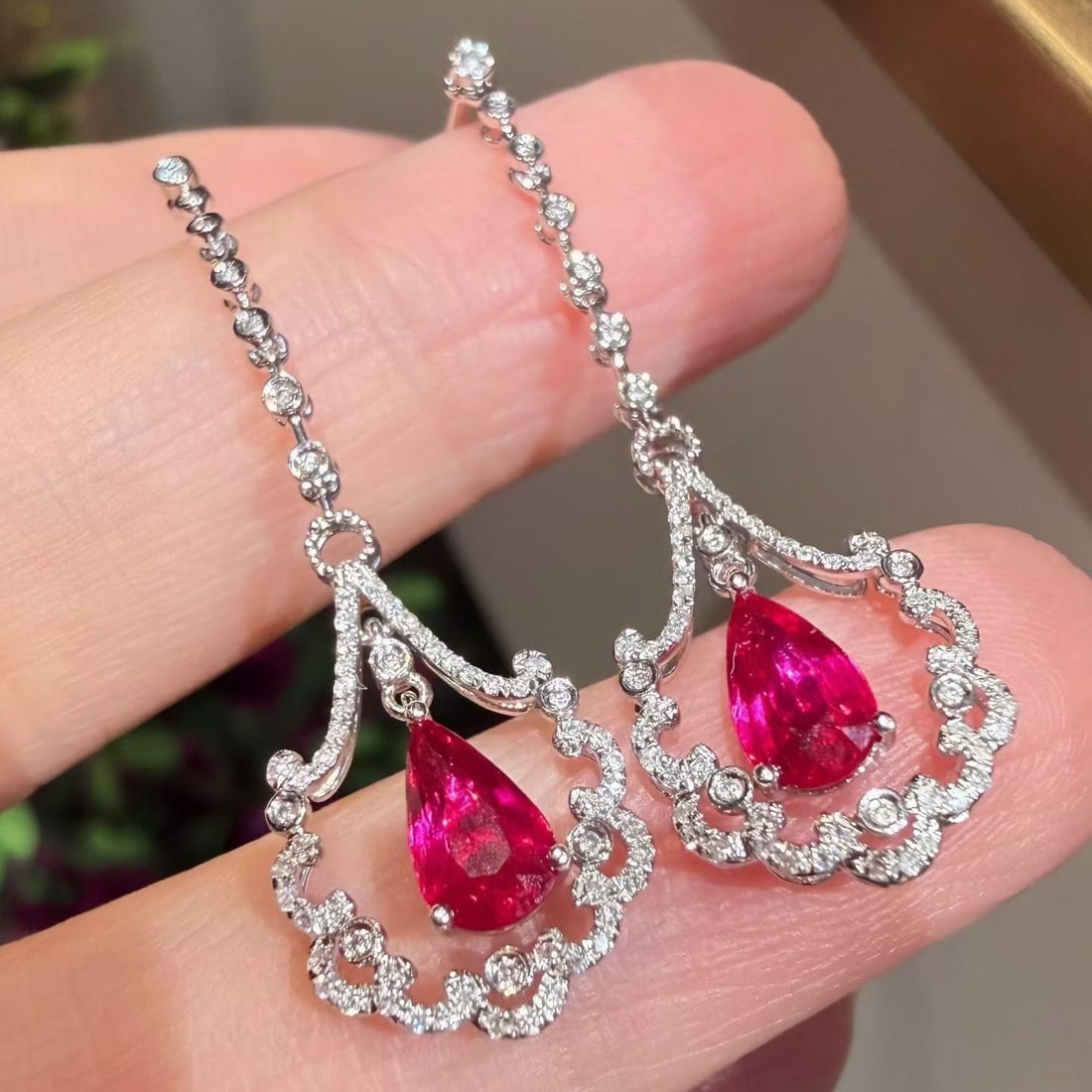 14k Gold 1.87 Ctw Natural Ruby & Diamond Earrings: Ref:231188398 // gold content:14k gold // main gemstone:ruby // shape:pear // carat weight:1. 12ct // color:red // treatment:natural // // adjacent gemstone 2 : diamond // shape:round // carat
