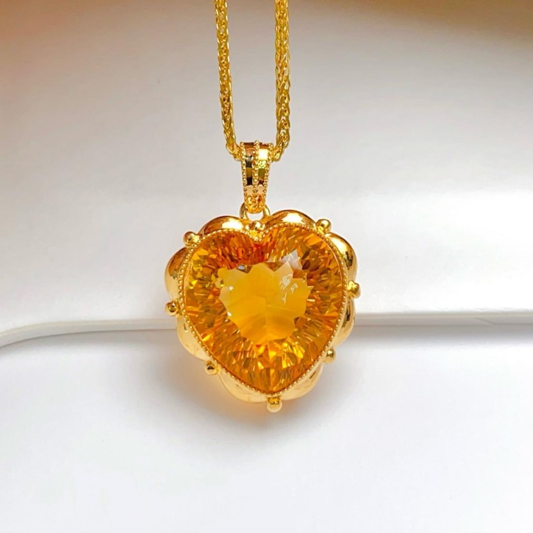 14k Gold 8.80 Ct Natural Citrine Pendant( Without Chain ): Ref:231188433 // gold content:14k gold // main gemstone:citrine // shape:heart // carat weight:8. 80ct // color:yellow // treatment:natural // Condition: New Low Estimate: 2000.00 High Estimate: 3000.