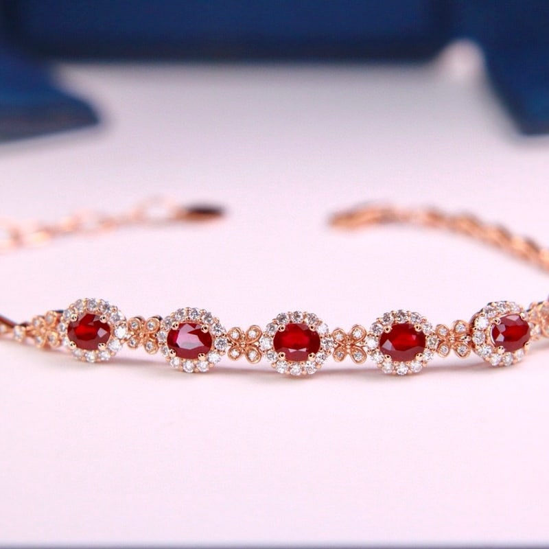 14k Gold 2.69 Ctw Natural Ruby & Diamond Bracelet: Ref:231188449 // gold content:14k gold // main gemstone:ruby // shape:oval // carat weight:1. 68ct // color:pigeonblood red // treatment:natural // // adjacent gemstone 2 : diamond // shape:round // c