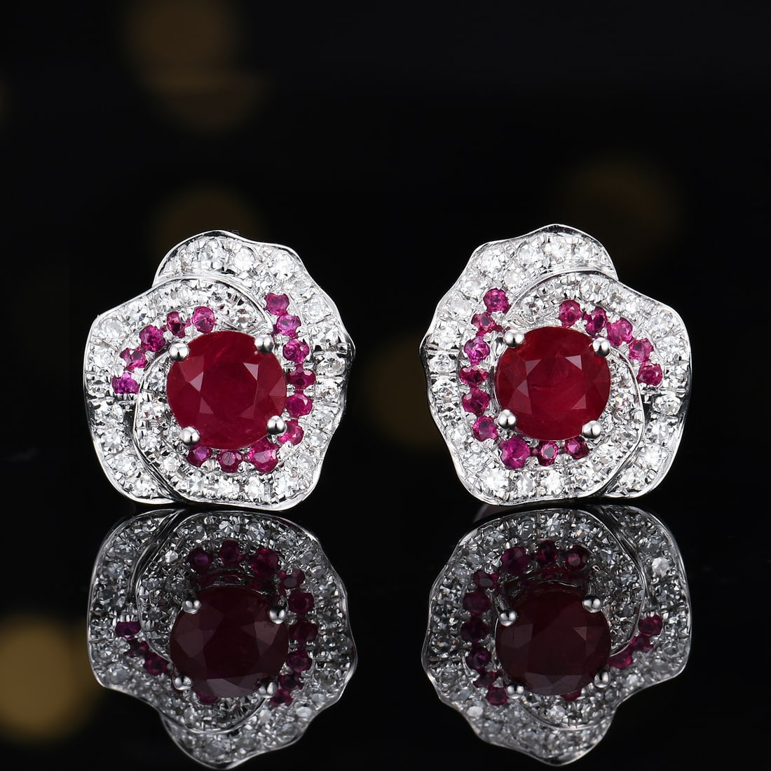 14k Gold 1.43 Ctw Natural Ruby & Diamond Earrings: Ref:231189001 // gold content:14k gold // main gemstone:ruby // shape:round // carat weight:1. 18ct // color:red // treatment:natural // cut grade:g // // adjacent gemstone 2 : diamond // number of