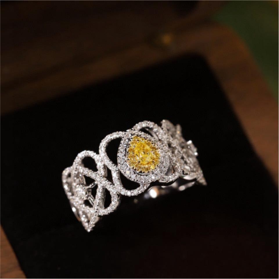 14k Gold 0.55 Ctw Natural Yellow Diamond & Diamond Ring: Ref:231189013 // gold content:14k gold // ring size:7. 25us // // main gemstone:yellow diamond // shape:pear // carat weight:0. 1ct // color:yellow // treatment:natural // // adjacent gemstone 2 :