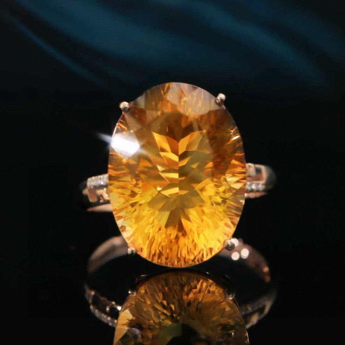 14k Gold 10.98 Ctw Natural Citrine & Diamond Ring: Ref:231189026 // gold content:14k gold // ring size:7. 25us // // main gemstone:citrine // shape:oval // carat weight:10. 95ct // color:yellow // treatment:natural // // adjacent gemstone 2 : diamond