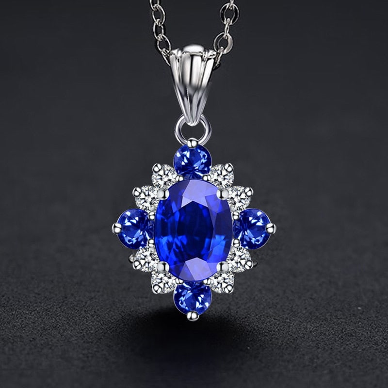 14k Gold 1.16 Ctw Natural Sapphire & Diamond Pendant( Without Chain ): Ref:231189036 // gold content:14k gold // main gemstone:sapphire // shape:oval // carat weight:1ct // color:blue // treatment:natural // // adjacent gemstone 2 : diamond // shape:round // carat weight