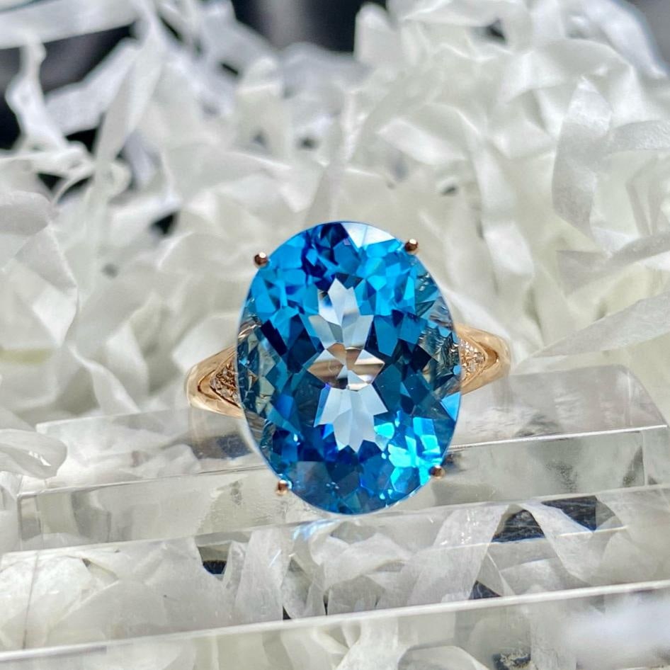14k Gold 9.25 Ct Natural Topaz & Diamond Ring: Ref:231189057 // gold content:14k gold // ring size:7. 25us // // main gemstone:topaz // shape:oval // carat weight:9. 25ct // color:blue // treatment:natural // // adjacent gemstone 2 : diamond //