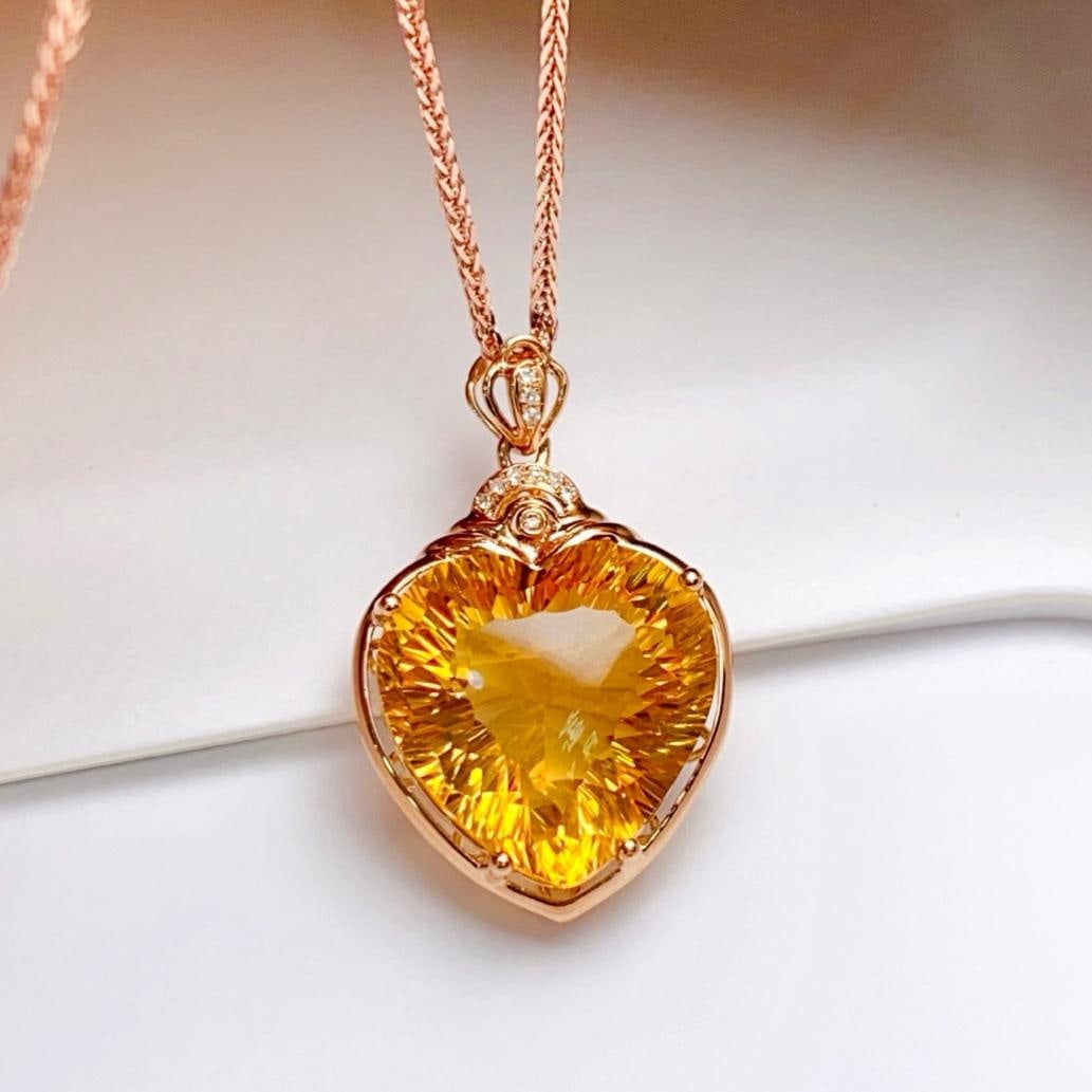 14k Gold 11.00 Ct Natural Citrine & Diamond Pendant( Without Chain ): Ref:231189074 // gold content:14k gold // main gemstone:citrine // shape:heart // carat weight:11. 00ct // color:yellow // treatment:natural // // adjacent gemstone 2 : diamond // number of stones:10 