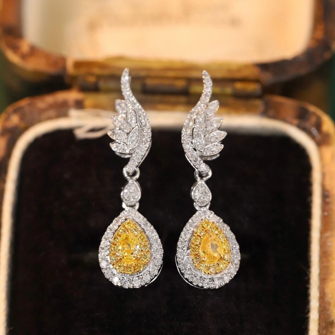14k Gold 0.60 Ctw Natural Yellow Diamond & Diamond Earrings: Ref:231189099 // gold content:14k gold // main gemstone:yellow diamond // shape:pear // carat weight:0. 18ct // color:yellow // treatment:natural // // adjacent gemstone 2 : diamond // shape:round // 